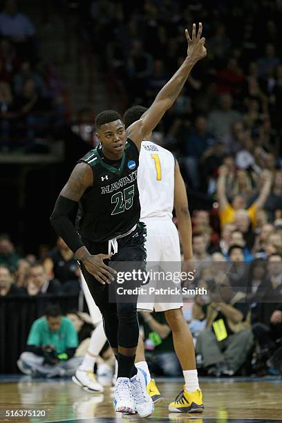 Michael Thomas of the Hawaii Warriors celebrates after hitting a three pointer in the second half against the California Golden Bears during the...