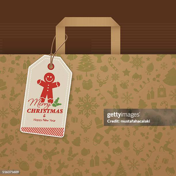christmas label on gift bag - brown paper shopping bag stock illustrations