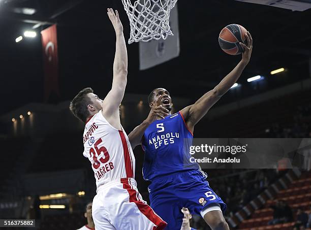 Derrick Brown of Anadolu Efes in action against Marko Arapovic of Cedevita Zagreb during the 2015-2016 Turkish Airlines Euroleague Basketball Top 16...