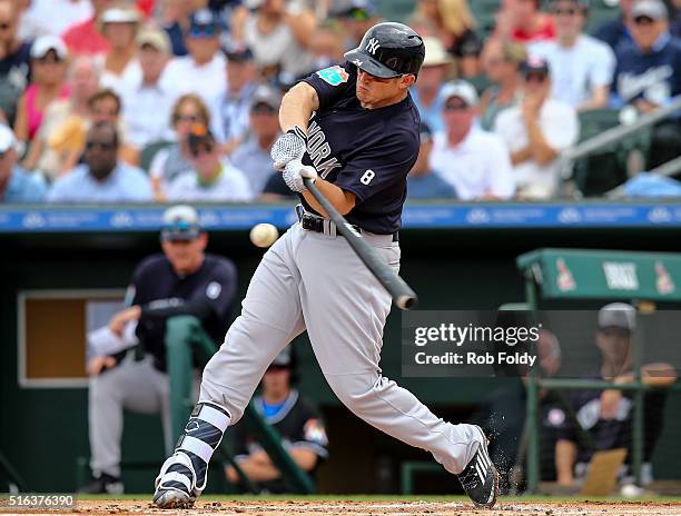 Chris Parmelee of the New York Yankees at bat during the spring training game against the Miami Marlins at Roger Dean Stadium on March 8, 2016 in...