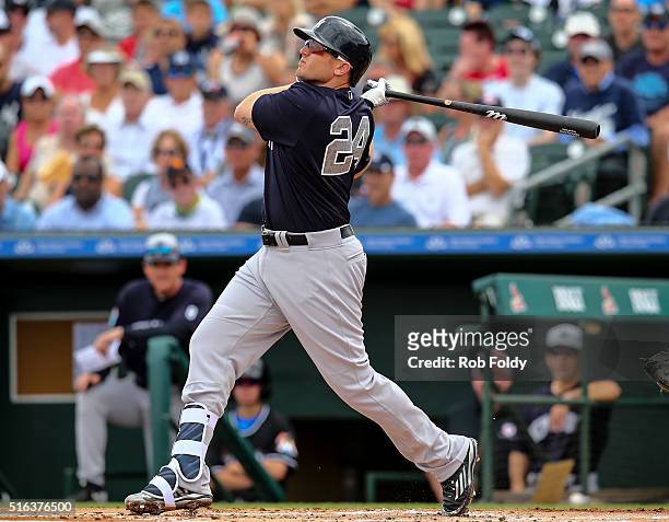 Chris Parmelee of the New York Yankees at bat during the spring training game against the Miami Marlins at Roger Dean Stadium on March 8, 2016 in...