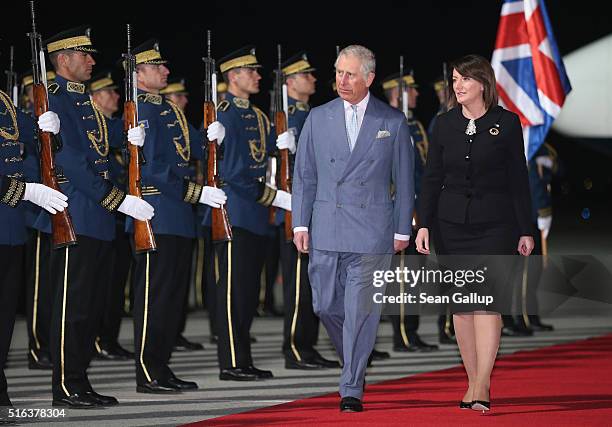 Prince Charles, Prince of Wales, reviews a Kosovar guard of honour with Kosovo President Atifete Jahjaga on March 18, 2016 in Pristina, Kosovo. The...