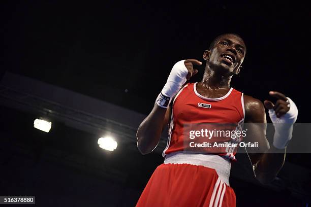 Yuberjen Hemey Martinez Rivas from Colombia celebrates after winning a fight against Nico Hernandez from USA during the Men's 46-49 kg category as...