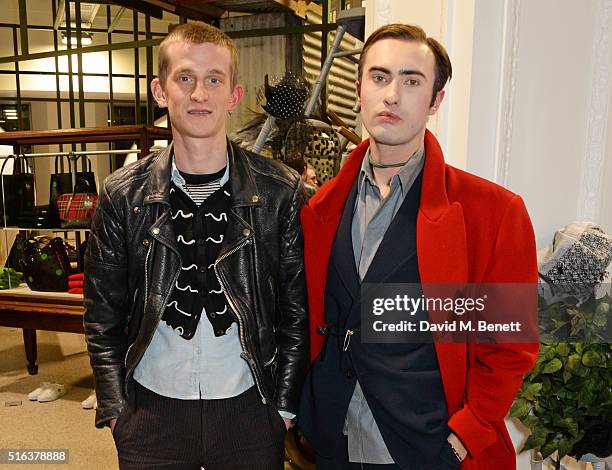 Jack Appleyard and Charles Jeffrey attend an exclusive VIP preview of the Dover Street Market on March 18, 2016 in London, England.