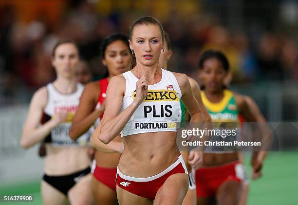 Renata Plis of Poland competes in the Women's 1500 metres heats during day two of the IAAF World Indoor Championships at Oregon Convention Center on...