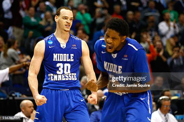 Reggie Upshaw of the Middle Tennessee Blue Raiders reacts after a dunk late in the game against the Michigan State Spartans during the first round of...