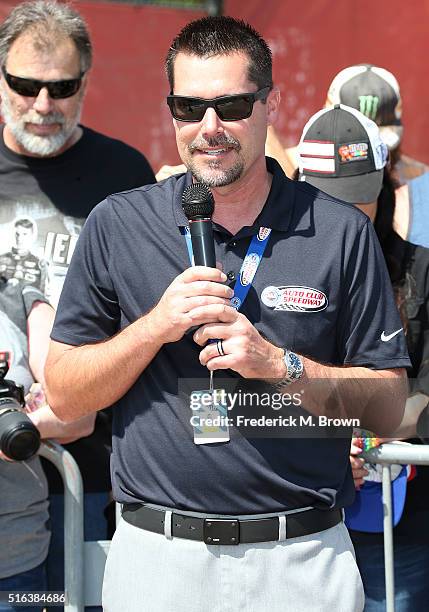 Dave Allen, President of the Auto Club Speedway, speaks during Brad Keselowski's Walk of Fame Induction Ceremony at the Auto Club 400 NASCAR Sprint...