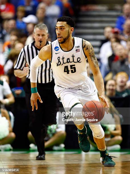 Denzel Valentine of the Michigan State Spartans in action during the first round of the NCAA Basketball Tournament game against the Middle Tennessee...