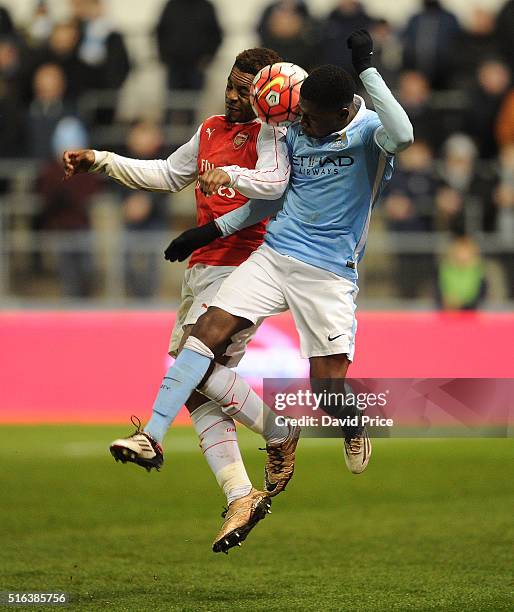 Tyrell Robinson of Arsenal takes on Isaac Buckley-Ricketts of Man City during the match between Manchester City and Arsenal in the FA Youth Cup semi...