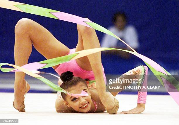 Alina Kabayeva of Russia performs part of her gold medal winning routine with the ribbon during the rhythmic gymnastic individual exercise final...