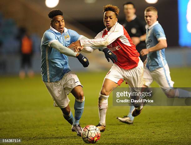 Chris Willock of Arsenal takes on Demeaco Duhaney of Man City during the match between Manchester City and Arsenal in the FA Youth Cup semi final 1st...
