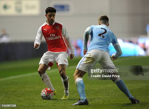 Chiori Johnson of Arsenal is closed down by Charlie Oliver of Man City during the match between Manchester City and Arsenal in the FA Youth Cup semi...