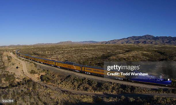The Salt Lake 2002 Olympic Torch Relay Train, provided by Union Pacific, rolls through the desert during the 2002 Salt Lake Olympic Torch Relay...