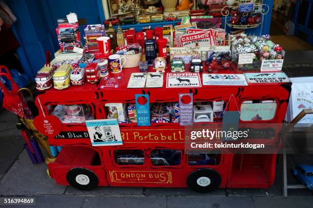 touristical items at portobello market london england - touristical stock pictures, royalty-free photos & images