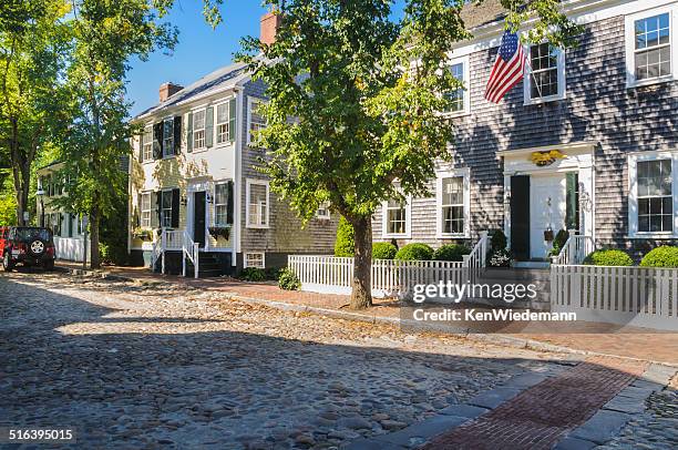 cobbled streets and classic homes - nantucket stockfoto's en -beelden