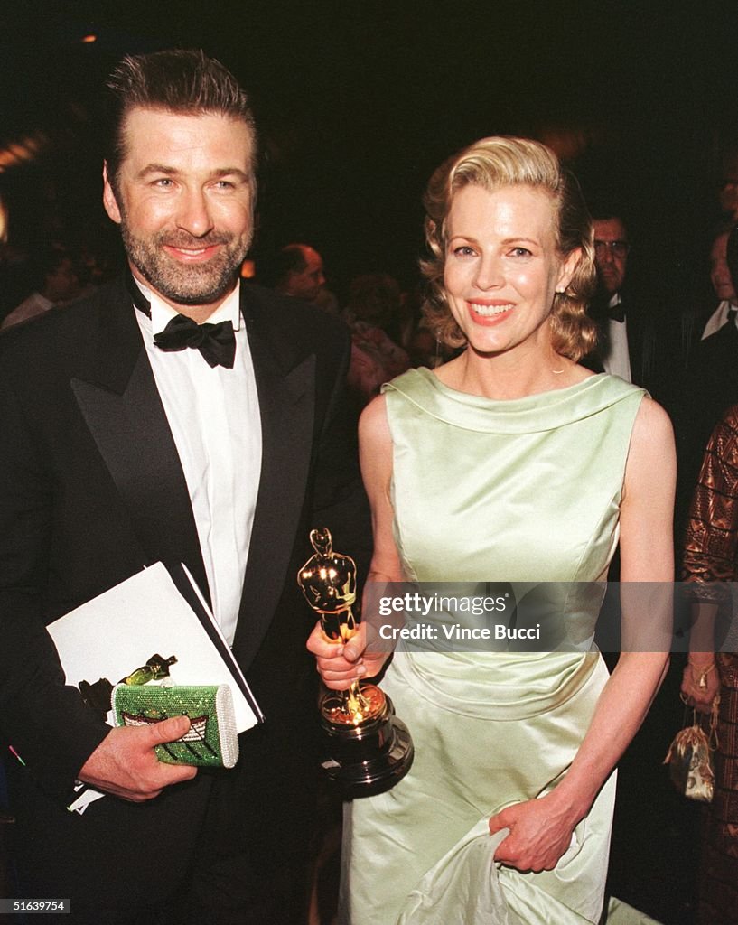 Oscar winner Kim Basinger (R) and her husband acto