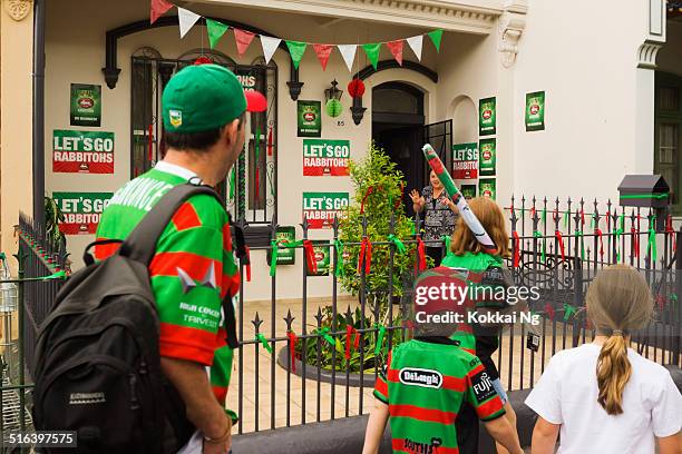 i think they are rabbitohs fans - rugby league fan stock pictures, royalty-free photos & images