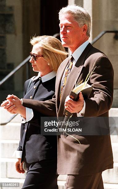 President Bill Clinton and First Lady Hillary Clinton leave Foundry United Methodist Church 05 March, Washington DC after attending Palm Sunday...