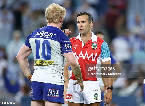 Referee Matt Cechin speaks to Bulldogs captain James Graham during the round three NRL match between the Canterbury Bulldogs and the Parramatta Eels...