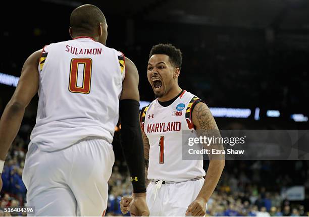 Rasheed Sulaimon and Jaylen Brantley of the Maryland Terrapins celebrate during the closing seconds of the Terrapins 79-74 win over the South Dakota...