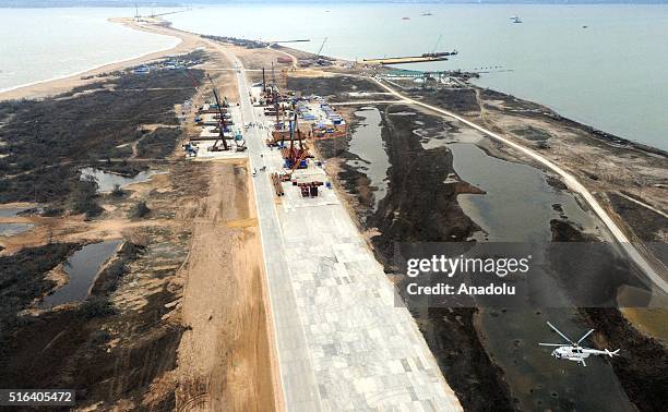 An aerial view of the construction site of a bridge across the Strait of Kerch. The Russian government plans to build a bridge linking mainland...