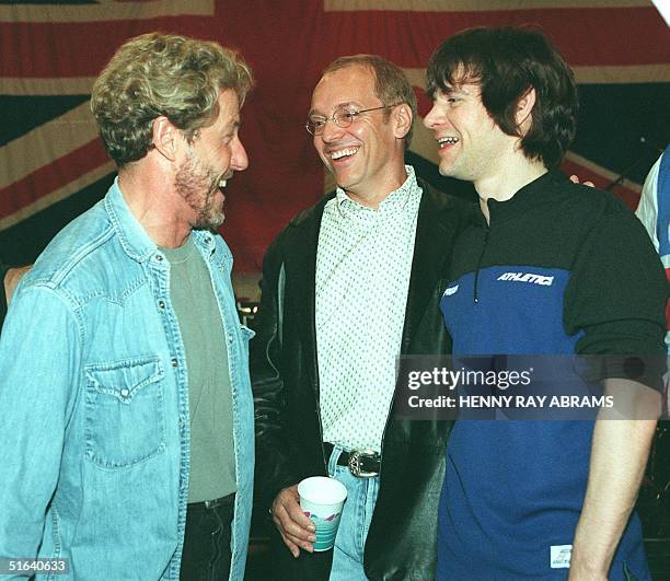 Roger Daltrey , lead singer of British rock band The Who, talks with fellow Britons Peter Frampton and Who drummer Zak Starkey , after rehearsing The...