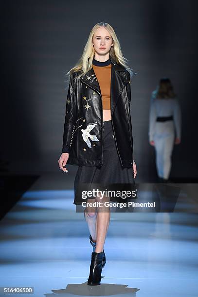 Model walks the runway wearing Maram 2016 collection during Toronto Fashion Week Fall 2016 at David Pecaut Square on March 18, 2016 in Toronto,...