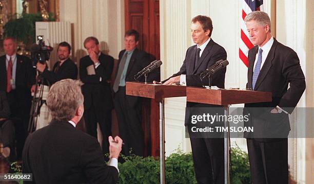 President Bill Clinton listens as CNN Correspondent Wolf Blitzer asks him how he would respond to Monica Lewinsky's family about the damage done to...