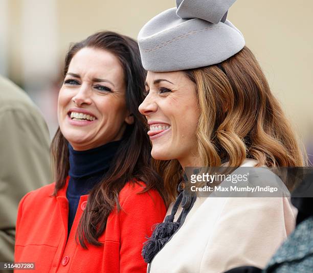 Kirsty Gallacher and Natalie Pinkham watch the racing as they attend day 4, Gold Cup Day, of the Cheltenham Festival on March 18, 2016 in Cheltenham,...