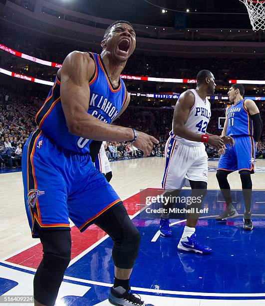 Russell Westbrook of the Oklahoma City Thunder reacts after a dunk against Elton Brand of the Philadelphia 76ers on March 18, 2016 at the Wells Fargo...