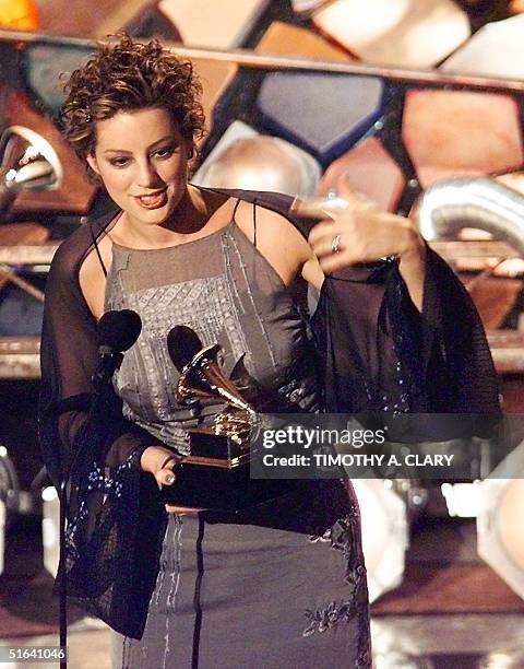 Sarah McLachlan holds up her Grammy Award for Best Female Pop Vocal Performance during the 40th Grammy Awards at Radio City Music Hall in New York 25...