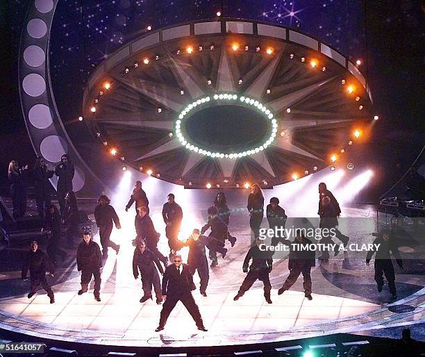 Will Smith performs his hit song "Men in Black" as a space ship lands on the stage to open the 40th Grammy Awards at Radio City Music Hall in New...