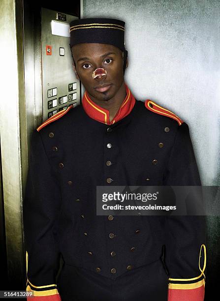 bellhop - bell boy stock pictures, royalty-free photos & images