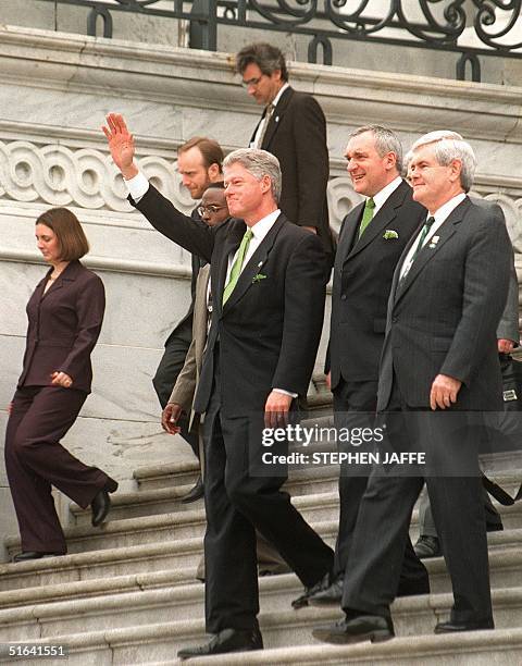 President BIll Clinton , Irish Prime Minister Bertie Ahern and Speaker of the House of Representatives Newt Gingrich walk down the steps of the US...