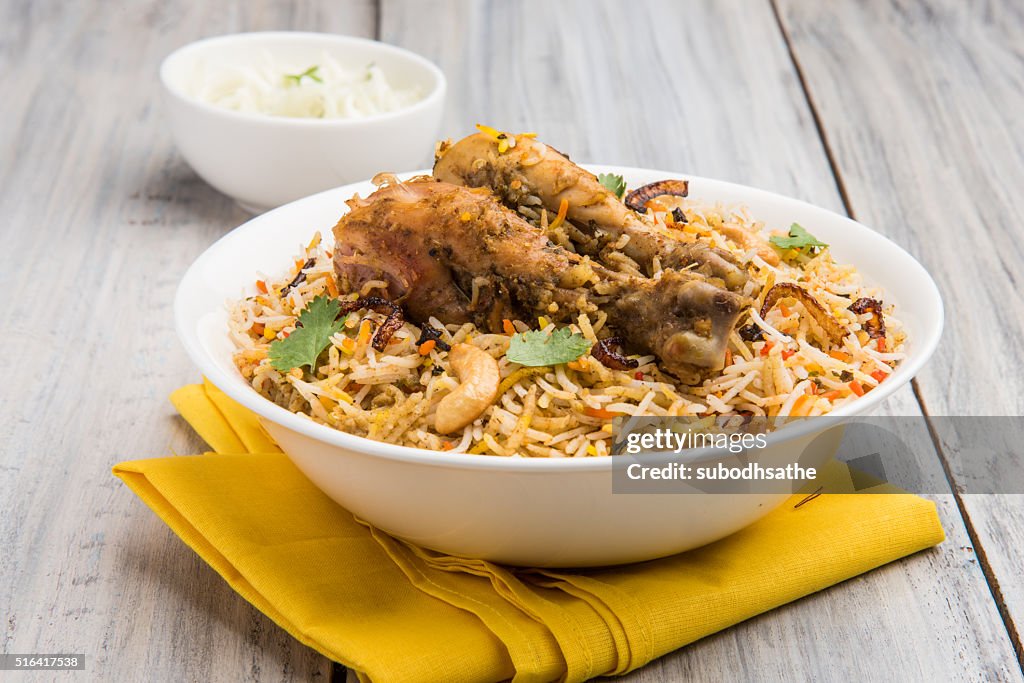 Authentic chicken biryani with onion raita