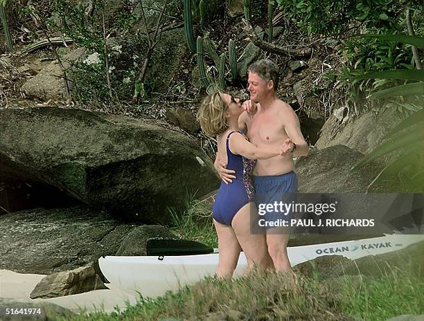 President Bill Clinton and First Lady Hillary Clinton dance on the beach of Megan Bay, St. Thomas, US Virgin Islands 04 January shortly after taking...