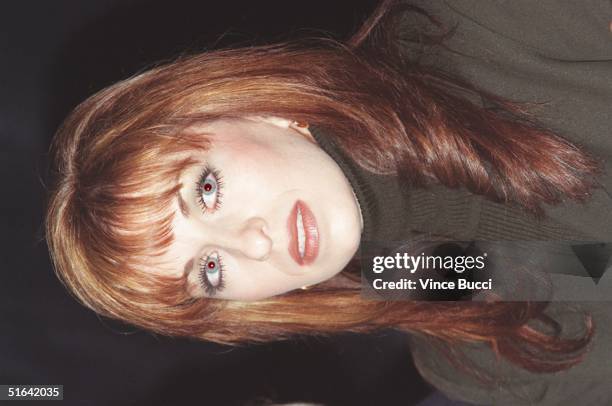 Paula Jones, who has accused US President Bill Clinton of sexual harrassment, listens to questions after her attorneys announced that the US Treasury...