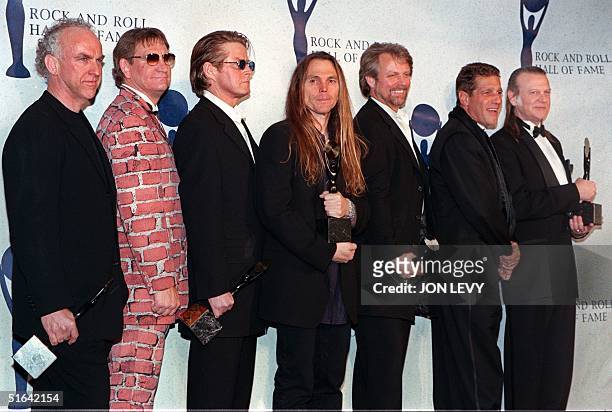 The Eagles Bernie Leadon, Joe Walsh, Don Henley, Timothy Schmit, Don Felder, and Randy Meisner appear together after receiving their awards and being...