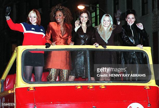 The Spice Girls' Ginger Spice -- Scary Spice -- Posh Spice -- Baby Spice -- and Sporty Spice -- arrive atop a double decker bus for a screening of...