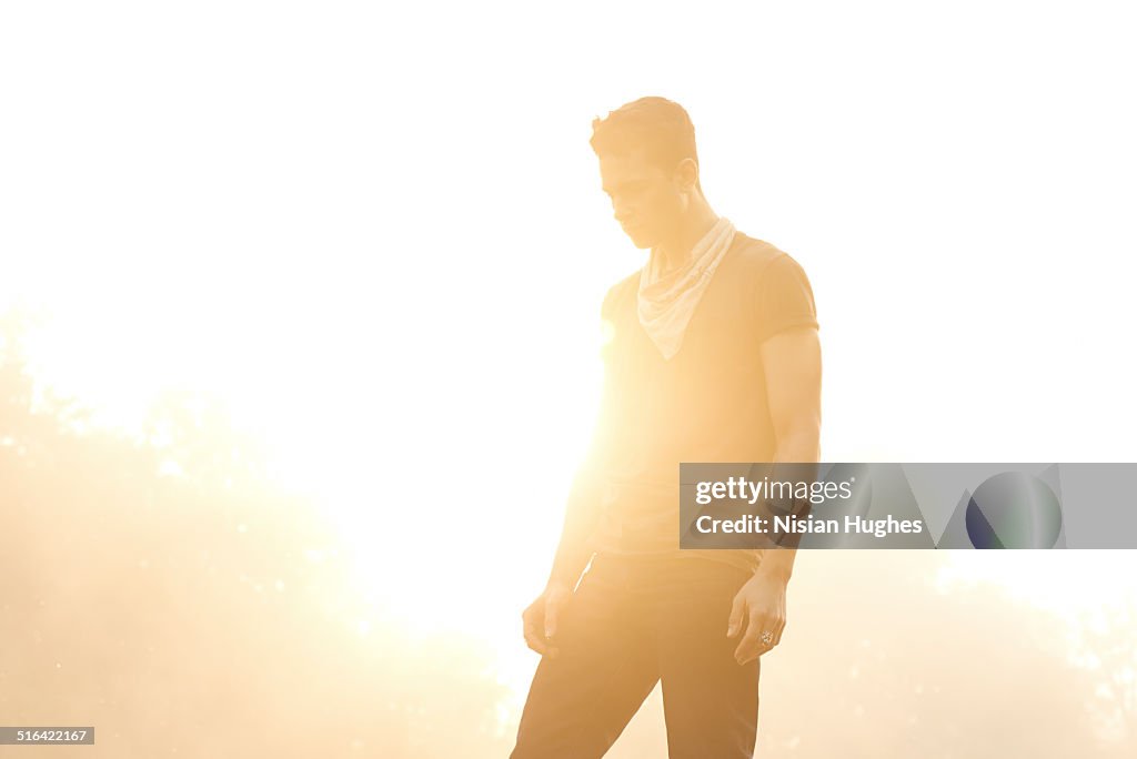 Portrait of man backlit by sun