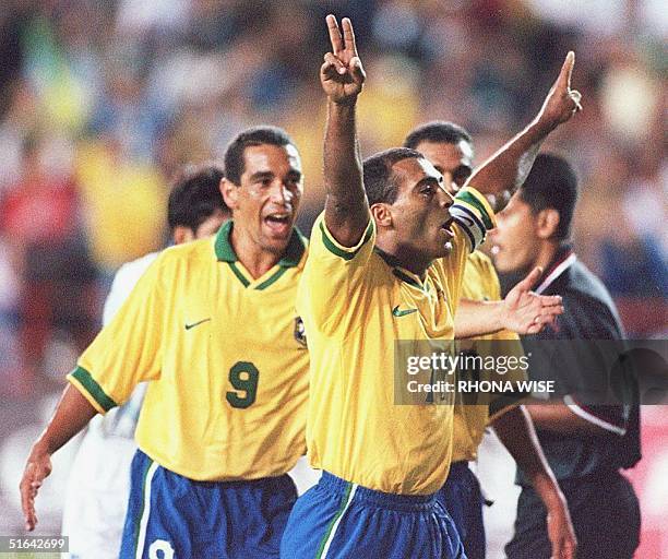 Zihno Romario of Brazil celebrates scoring a penalty kick with Zinho and ...