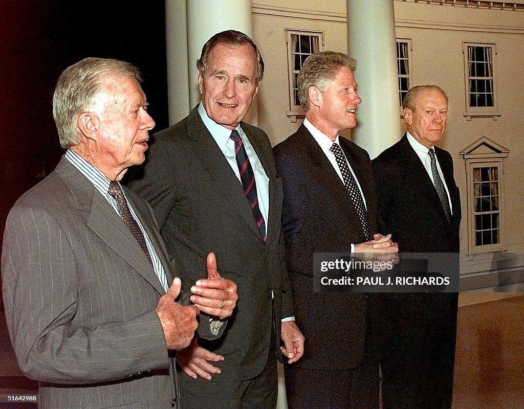(From L-R) Former US presidents Jimmy Carter and G