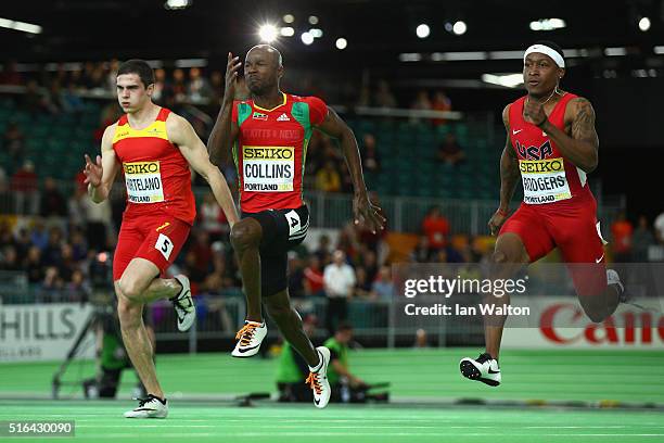 Bruno Hortelano of Spain, Kim Collins of Saint Kitts and Nevis and Mike Rodgers of the United States compete in the Men's 60 Metres Semi-Final during...