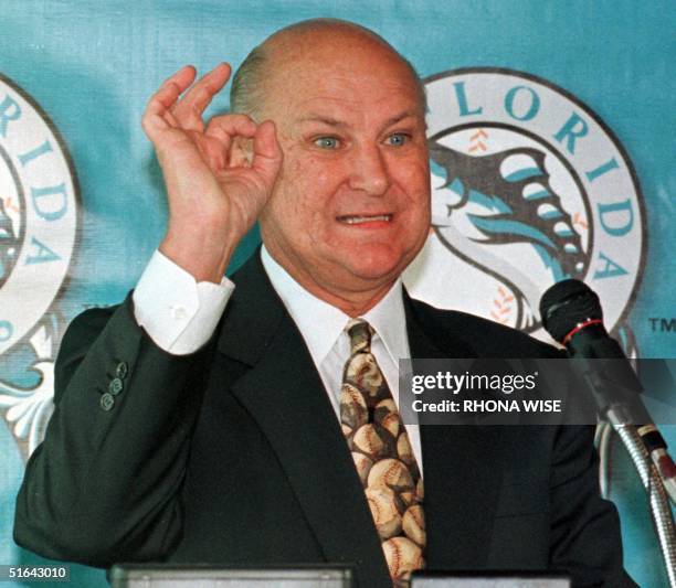 Florida Marlins' current owner H. Wayne Huizenga shows the media how much revenue the Florida Marlins earn from the stadium suites during a press...