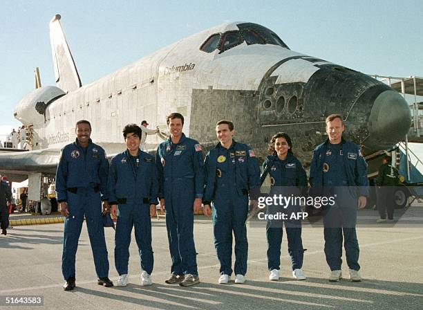 The crew of the space shuttle Columbia Winston Scott of the US, Takao Doi of Japan, mission Commander Kevin Kregel of the US, Leonid Kadenyuk of...