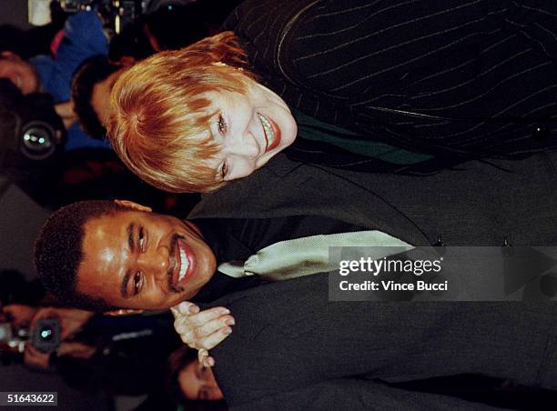 Actor Cuba Gooding Jr arrives with actress Shirley MacLaine for the premiere of "As Good As It Gets" 06 December in Los Angeles. Gooding stars in the...