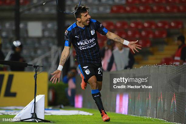 Edgar Benitez of Queretaro celebrates after scoring the first goal of his team during the 11th round match between Queretaro and Chiapas as part of...