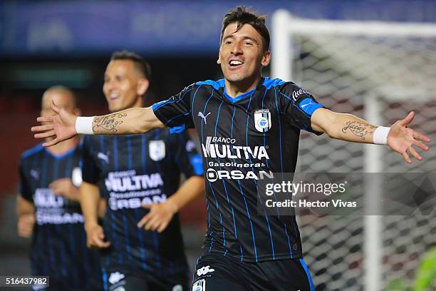 Edgar Benitez of Queretaro celebrates after scoring the first goal of his team during the 11th round match between Queretaro and Chiapas as part of...