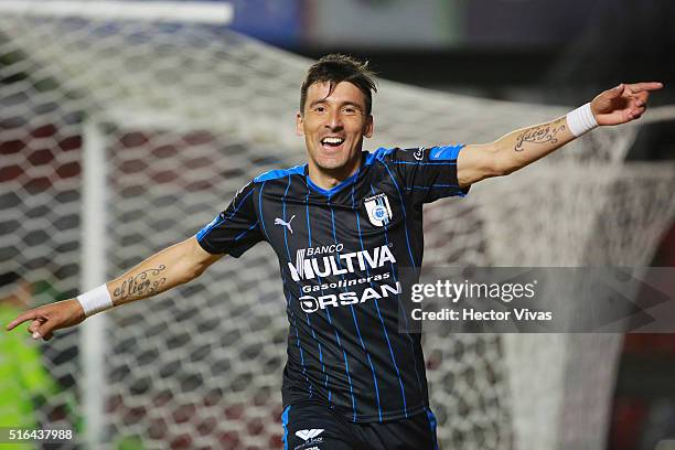 Edgar Benitez of Queretaro celebrates after scoring the first goal of his team during the 11th round match between Queretaro and Chiapas as part of...