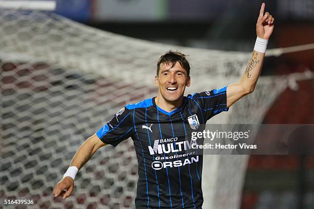 Edgar Benitez of Queretaro celebrates after scoring the first goal of his team during the 11th round match between Queretaro and Chiapas as part of...